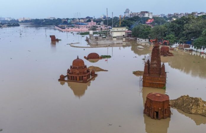 Flood-affected areas in Bihar with inundated fields.